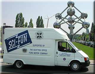 The SCI-FUN van in front of the Atomium, in Brussels