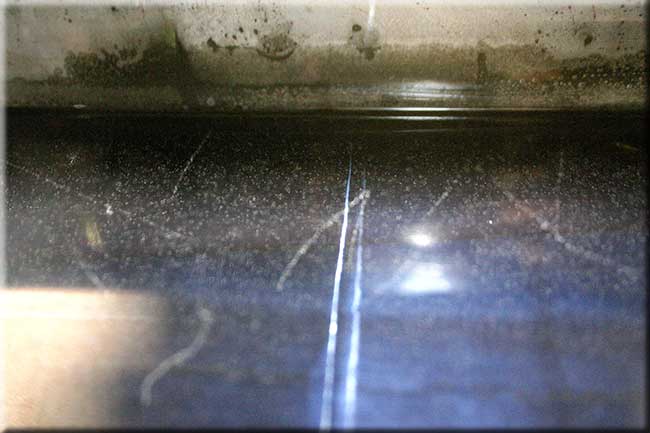 A cloud chamber photograph of assorted particle tracks